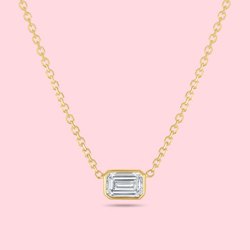 1 carat emerald cut diamond bezel